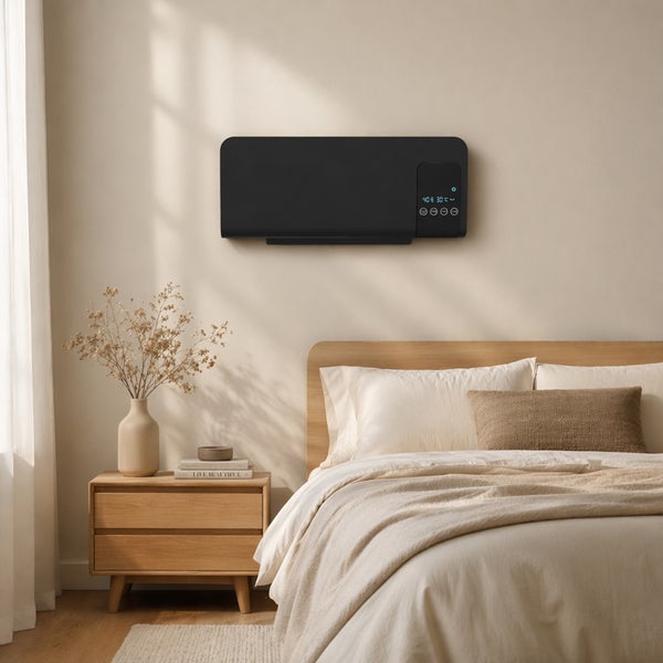 Wandheizung in einem modernen Schlafzimmer montiert mit digitaler Temperaturanzeige über einem Holzbett.