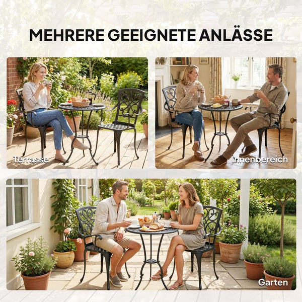 Schwarzes Bistro-Gartenset aus Metall mit Rundtisch und zwei verzierten Stühlen auf einer hellen Terrasse mit Pflanzen und einer lesenden Frau.