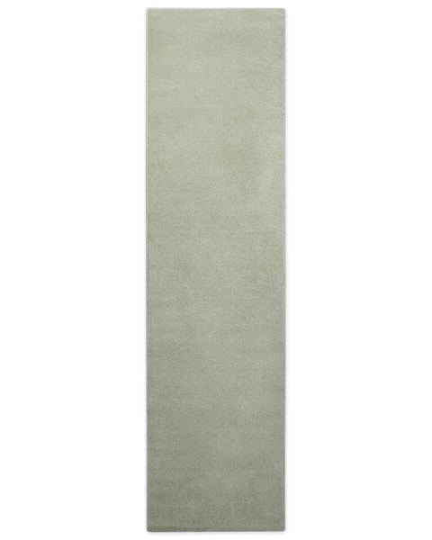 Langer rechteckiger Teppichläufer mit weicher Kurzflor-Textur in Hellgrün.