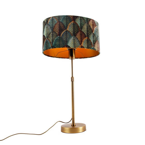 Tischleuchte mit Lampenschirm und Blattmuster