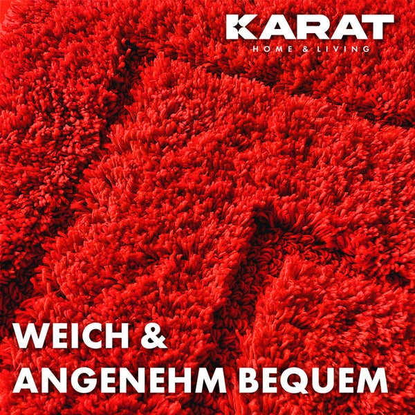 Detailansicht eines roten Hochflor Teppichs der Marke Karat Home and Living