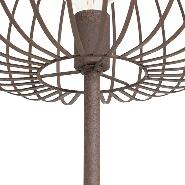 Detailaufnahme einer Lampe mit Drahtschirm