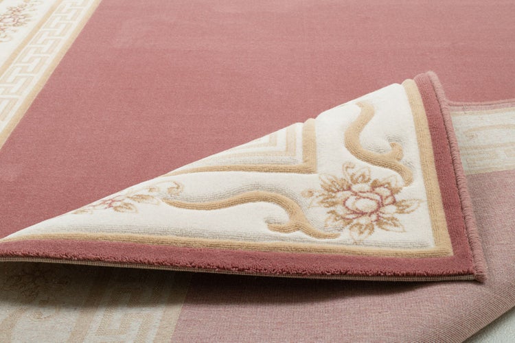 Gewebter Wollteppich mit Bordüre Pelinia Rosa 60x110 cm