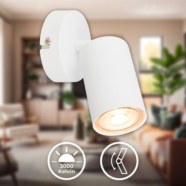 Wandstrahler in Weiß mit schwenkbarem Kopf, 3000 Kelvin warmweißes Licht, eingeschaltet im Wohnraum.