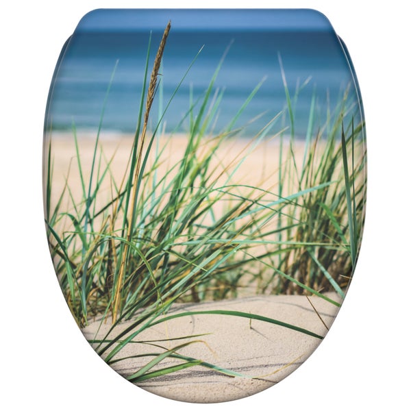 Toilettensitz mit aufgedrucktem Strandmotiv und Dünengras