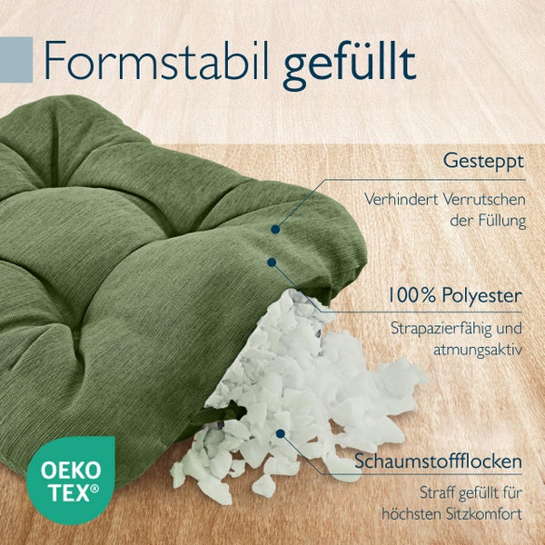 Detailaufnahme eines formstabilen, gefüllten Sitzkissens mit gesteppter Oberfläche aus 100 Prozent Polyester und Schaumstoffflocken-Füllung sowie Oeko-Tex Siegel