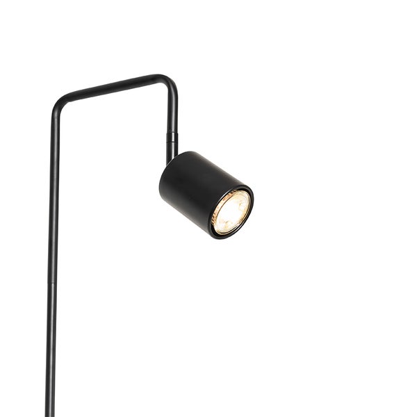 Schwarze Stehlampe mit zylindrischem Lampenkopf