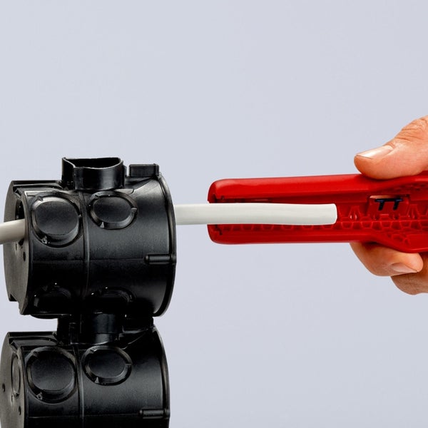 Abisolierzange mit Kabel und Abzweigdose