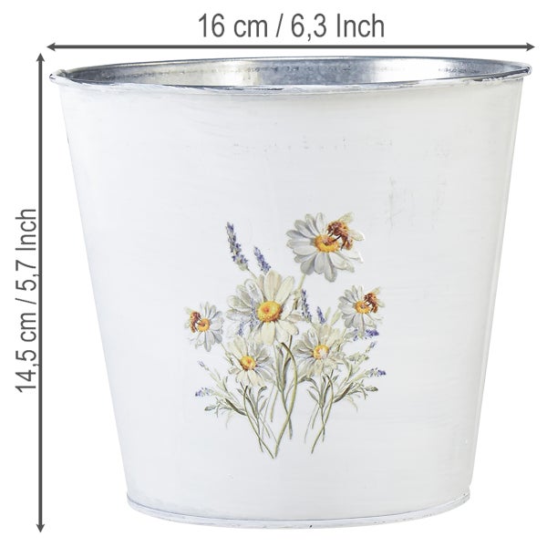 Weißer Metallübertopf mit Blumen- und Bienenmotiv, Höhe 14,5 Zentimeter, Durchmesser 16 Zentimeter.