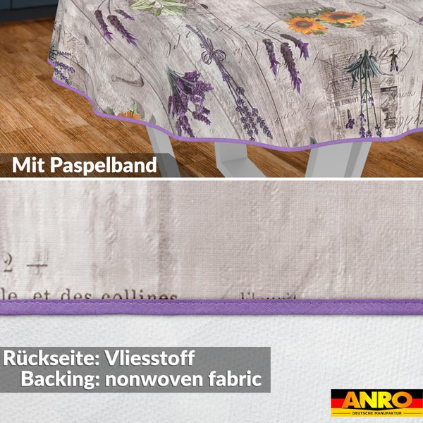 Rund-Tischdecke mit Lavendel- und Sonnenblumenmotiv, Paspelband und Vliesrückseite. ANRO Logo.