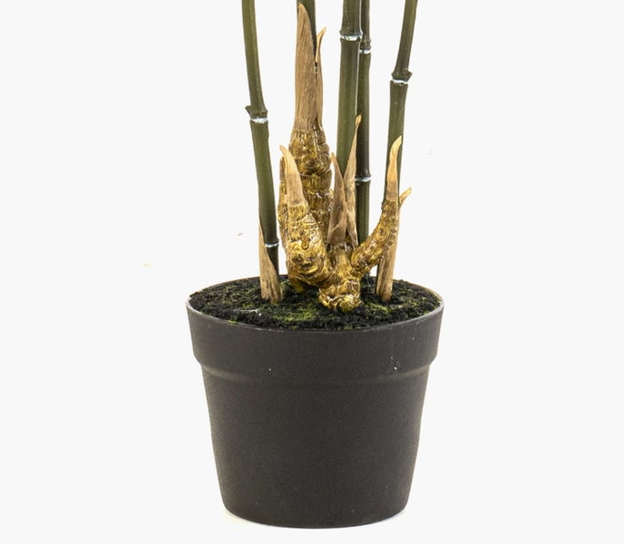 Künstliche Stockrose mit roten Blüten, grünen Blättern und Knospen am Stiel.