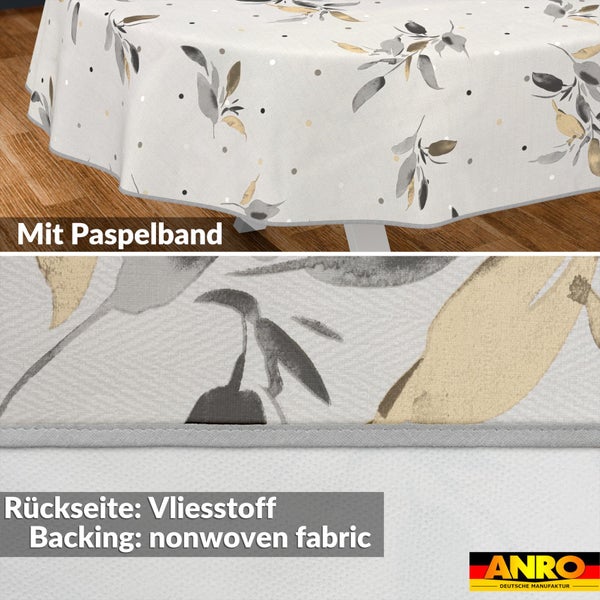 Tischdecke mit Blättermuster, Paspelband und Vliesrückseite, ANRO Logo.