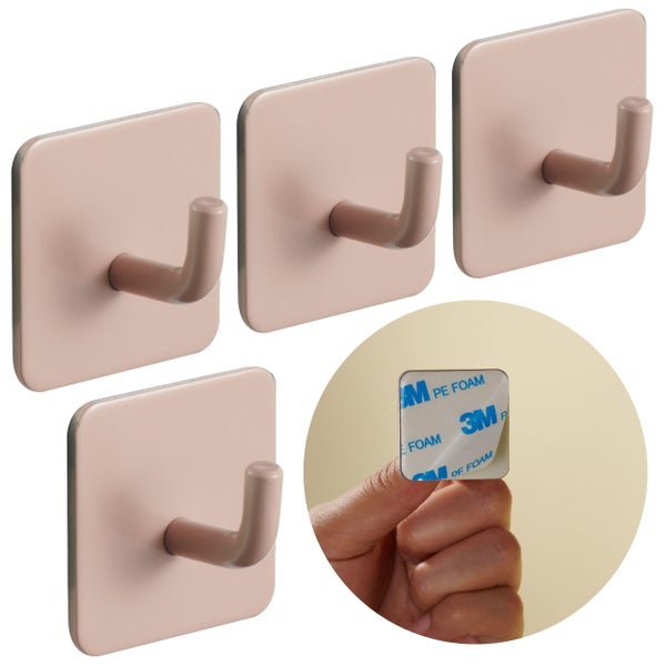 Set aus vier quadratischen selbstklebenden Wandhaken mit 3M-Klebepad auf der Rückseite.