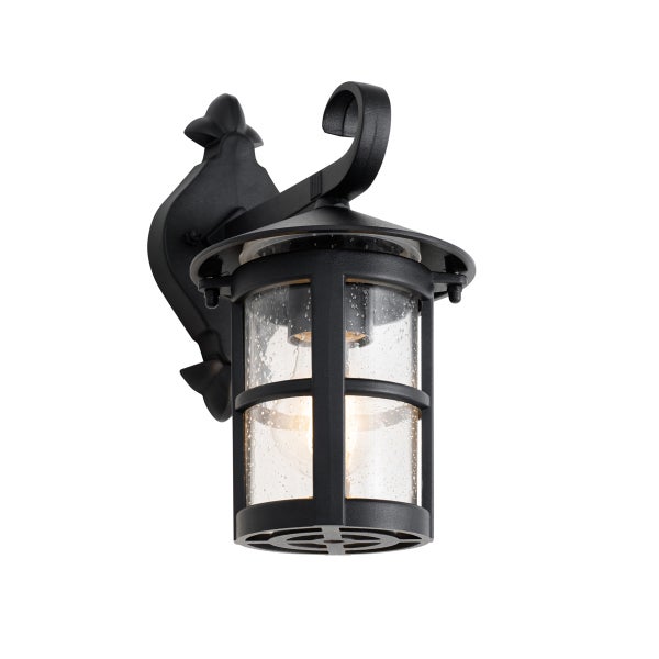 Rustikale Außenwandleuchte aus schwarzem Metall mit zylindrischem Glasschirm und dekorativem Wandhalter.