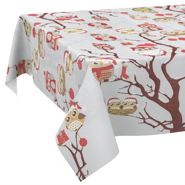 Tischdecke mit Weihnachtsmotiv bedruckt mit Eulen auf Ästen, Nikolausmützen und Geschenken.