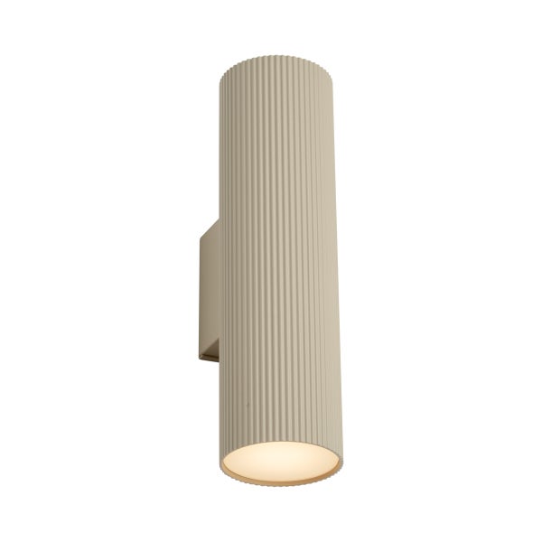 Moderne zylindrische Wandleuchte mit gerippter Oberfläche für eine stimmungsvolle Beleuchtung.