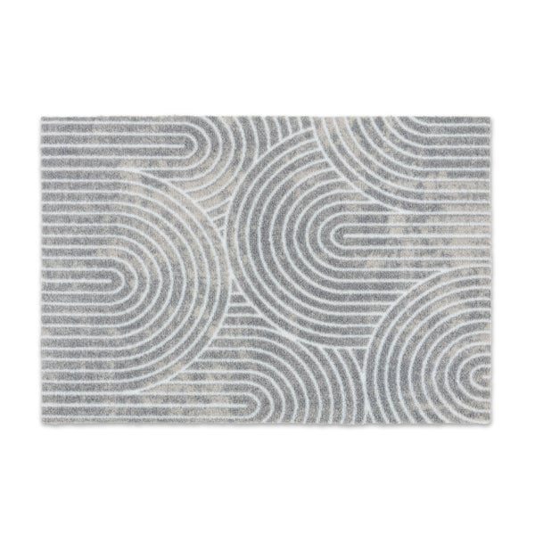 Rechteckiger Teppich mit geometrischem Muster aus konzentrischen Bögen in Grau und Weiß.