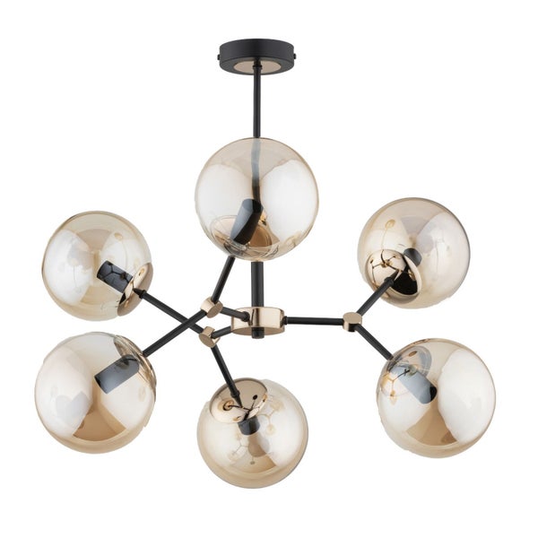 Moderne sechsflammige Deckenleuchte mit kugelförmigen Glasschirmen und Metallgestell in geometrischem Design.