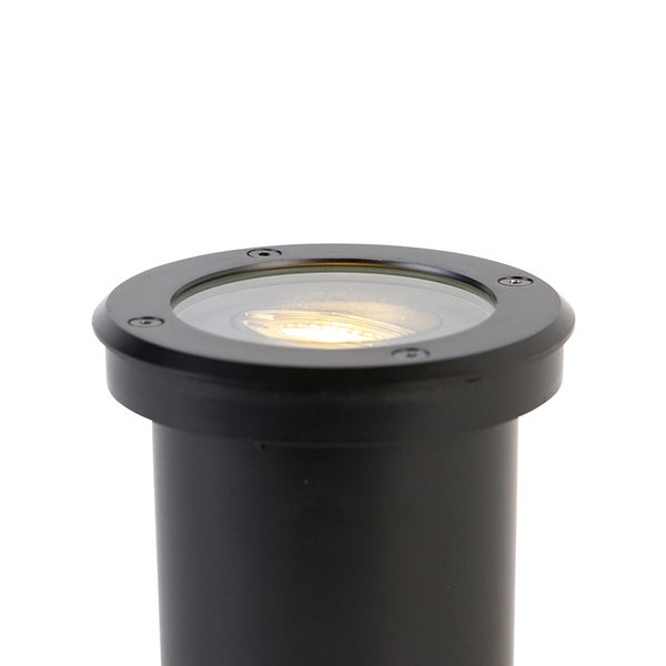 Schwarzer Bodeneinbaustrahler für den Außenbereich mit runder Glasabdeckung und warmem Licht.