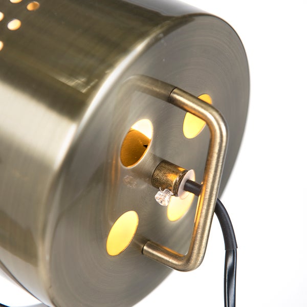 Zylindrische Metallleuchte in Messingoptik mit Griff und Lichtaustrittsöffnungen
