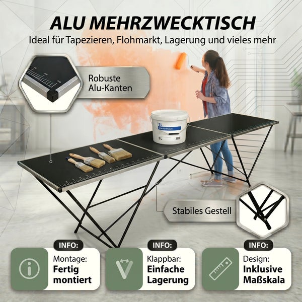 Heller Raum mit Frau beim Wandanstrich neben klappbarem Aluminium-Mehrzwecktisch mit integrierter Maßskala und stabilem Gestell.