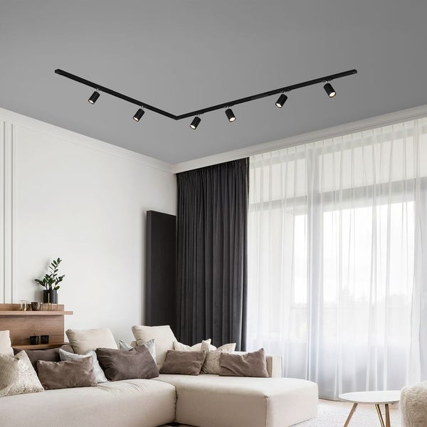 Zwei schwarze Strahler an einem Schienensystem für die Deckenbeleuchtung