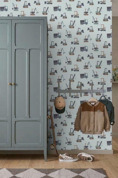 Vliestapete für das Kinderzimmer mit Baustellen-Motiven wie Baggern, Kränen und Lastwagen.