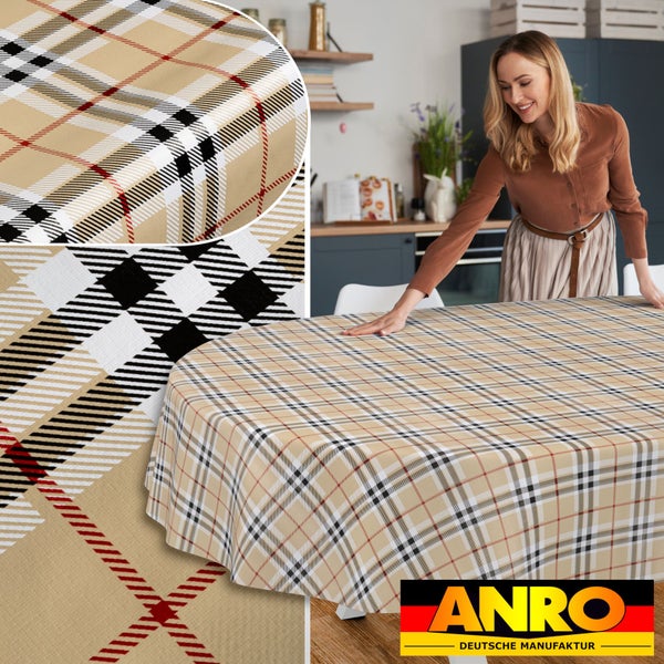 Ovale Tischdecke mit Karomuster auf einem Esstisch in einer Küche, inklusive Detailansichten der Struktur und ANRO Deutsche Manufaktur Logo.