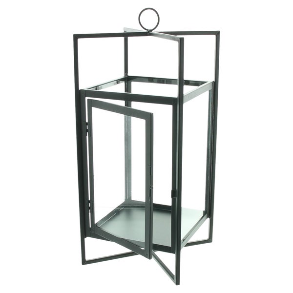 Schwarze Laterne aus Metall und Glas mit rechteckigem geometrischem Rahmen und Ring oben, Tür geöffnet.