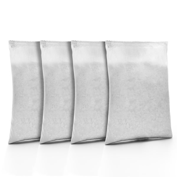Vier weiße Vliesbeutel mit granulärer Füllung.