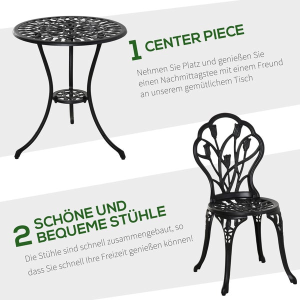 Runder Gartentisch und Gartenstuhl aus Metall mit dekorativen Ornamenten und floralen Mustern.
