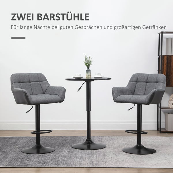 Zwei Barstühle und ein Bartisch bilden eine Sitzgruppe.