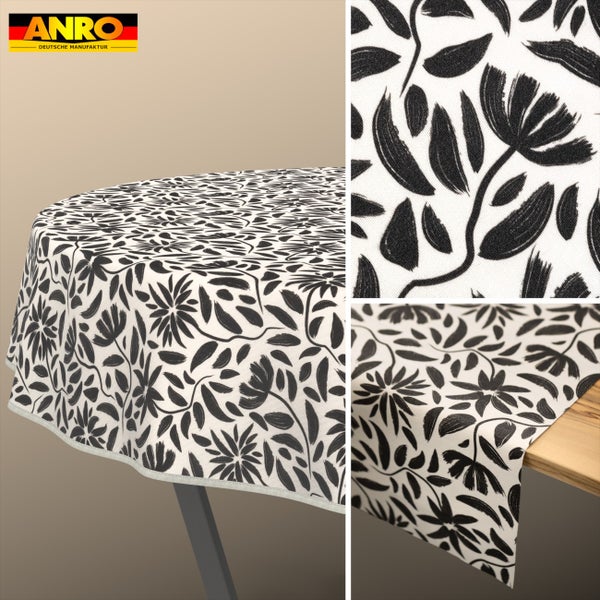 Tischdecke mit floralem Muster im Pinselstrich-Design auf einem runden und einem eckigen Tisch. ANRO Logo.