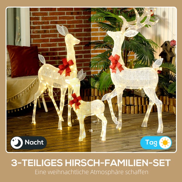 Dreiteiliges Hirsch-Familien-Set aus weißem Drahtgeflecht mit roten Schleifen, warmweiß beleuchtet in einer Gartenumgebung bei Tag und Nacht.