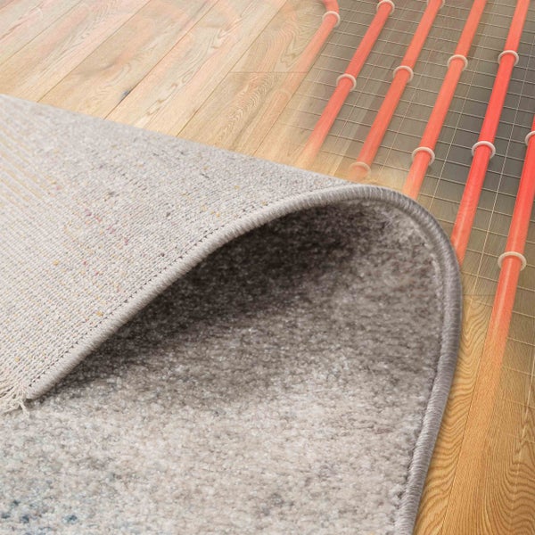 Teppich auf Holzboden mit Fussbodenheizung