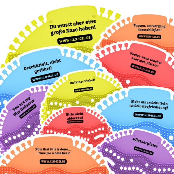 Mehrere Urinal-Siebe mit verschiedenen Aufschriften