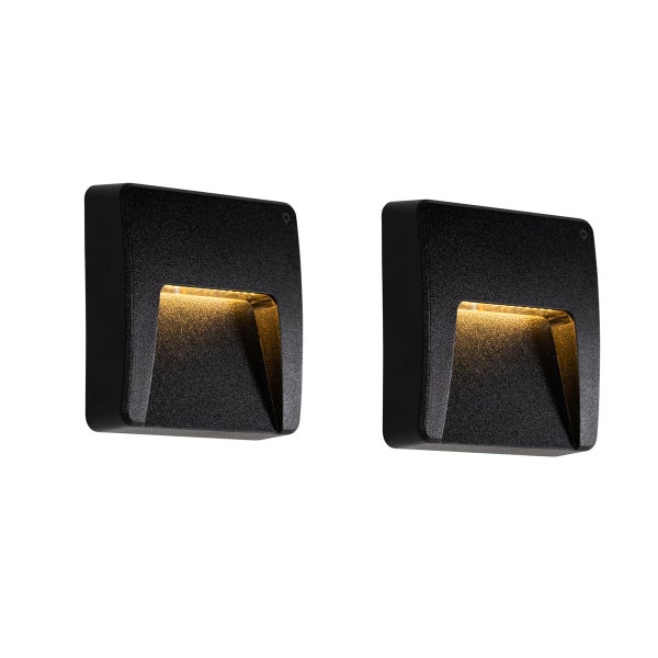 Zwei quadratische LED-Außenwandleuchten in Schwarz mit warmweißem Lichtaustritt nach unten.