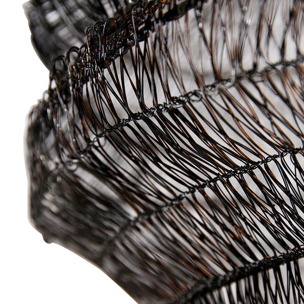 Detailaufnahme eines Drahtgeflechts, das für Bau- oder Gartenzwecke verwendet werden kann.