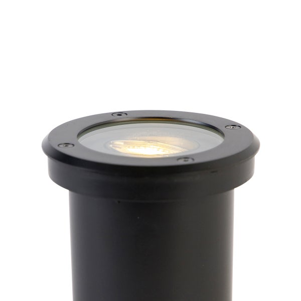 Runder Bodeneinbaustrahler in Schwarz mit eingeschaltetem Licht.