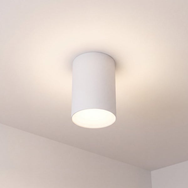 Zylindrische Deckenleuchte zur Aufbaumontage, moderner Aufbaustrahler mit warmem Licht.