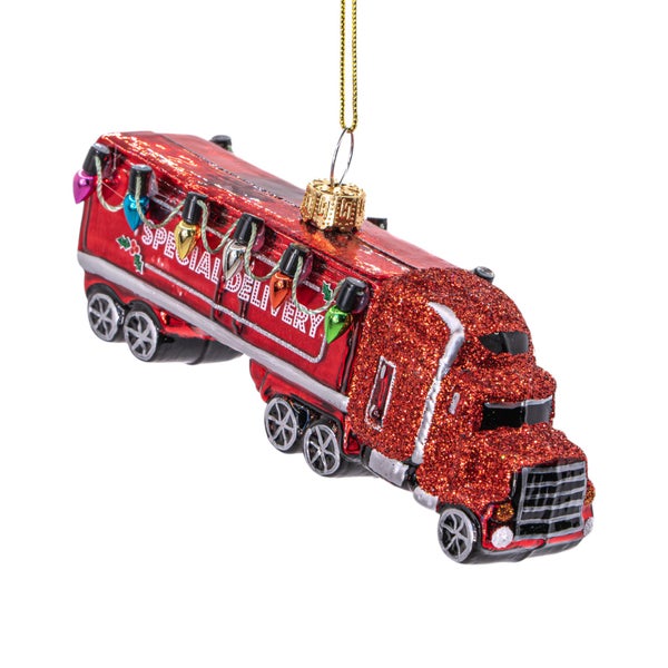Weihnachtsbaumschmuck in Form eines roten Lastwagens mit der Aufschrift Sonderlieferung