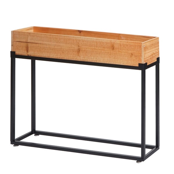 Rechteckiger Pflanzkasten aus Holz auf einem hohen schwarzen Metallgestell.