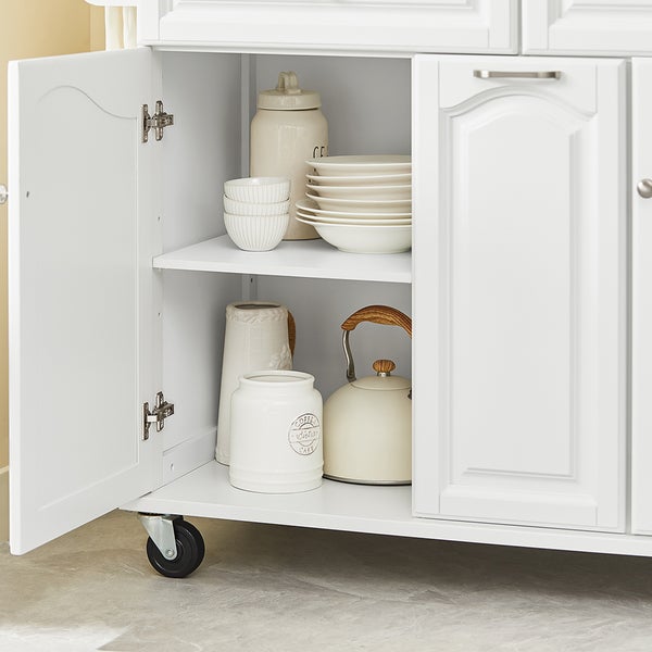 Küchenwagen mit Geschirr und offenem Schrank
