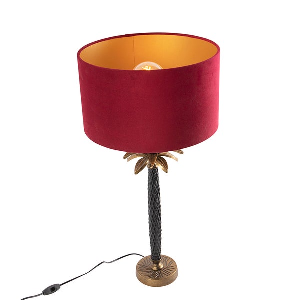Tischleuchte mit rotem Lampenschirm und Palmenfuß