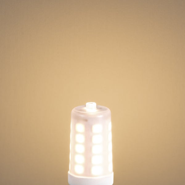 Leuchtendes LED-Leuchtmittel mit warmweißem Licht und mehreren LED-Chips.