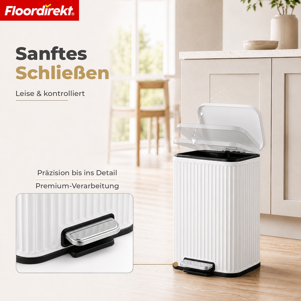 Floordirekt Logo. Tretmülleimer mit Soft-Close-Funktion und vertikal gerippter Struktur in einer hellen Küche.