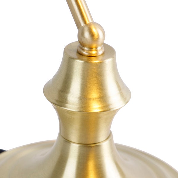 Detail einer goldenen Lampe