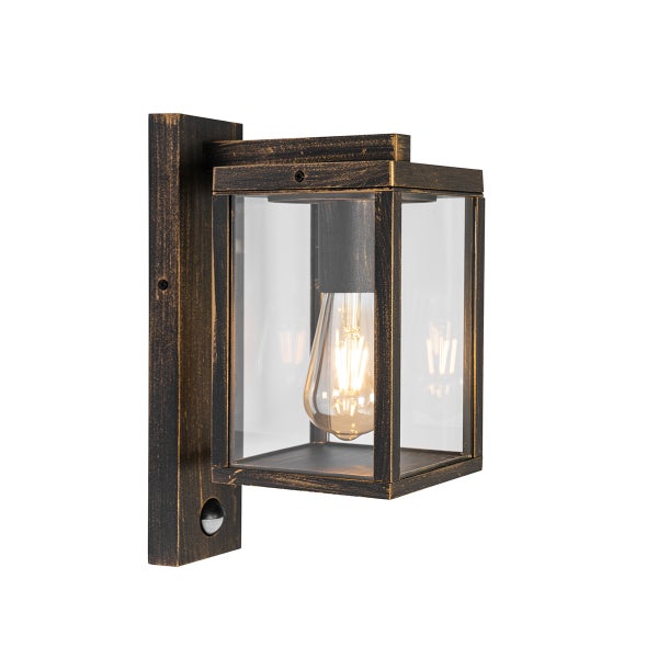 Rustikale Außenwandleuchte aus Metall und Glas mit Bewegungsmelder und sichtbarem Leuchtmittel.