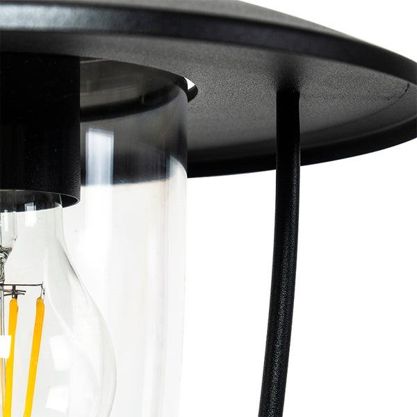 Detailansicht einer schwarzen Außenleuchte mit klarem Glaszylinder und LED-Filament-Leuchtmittel.