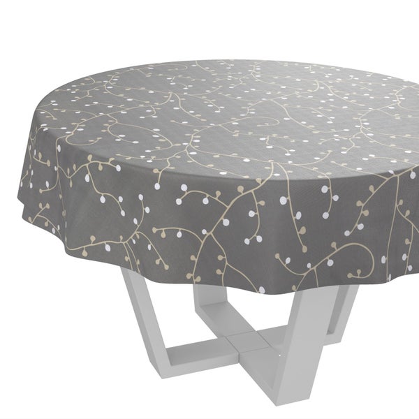 Runde graue Tischdecke mit beigem Rankenmuster auf einem Tischgestell.